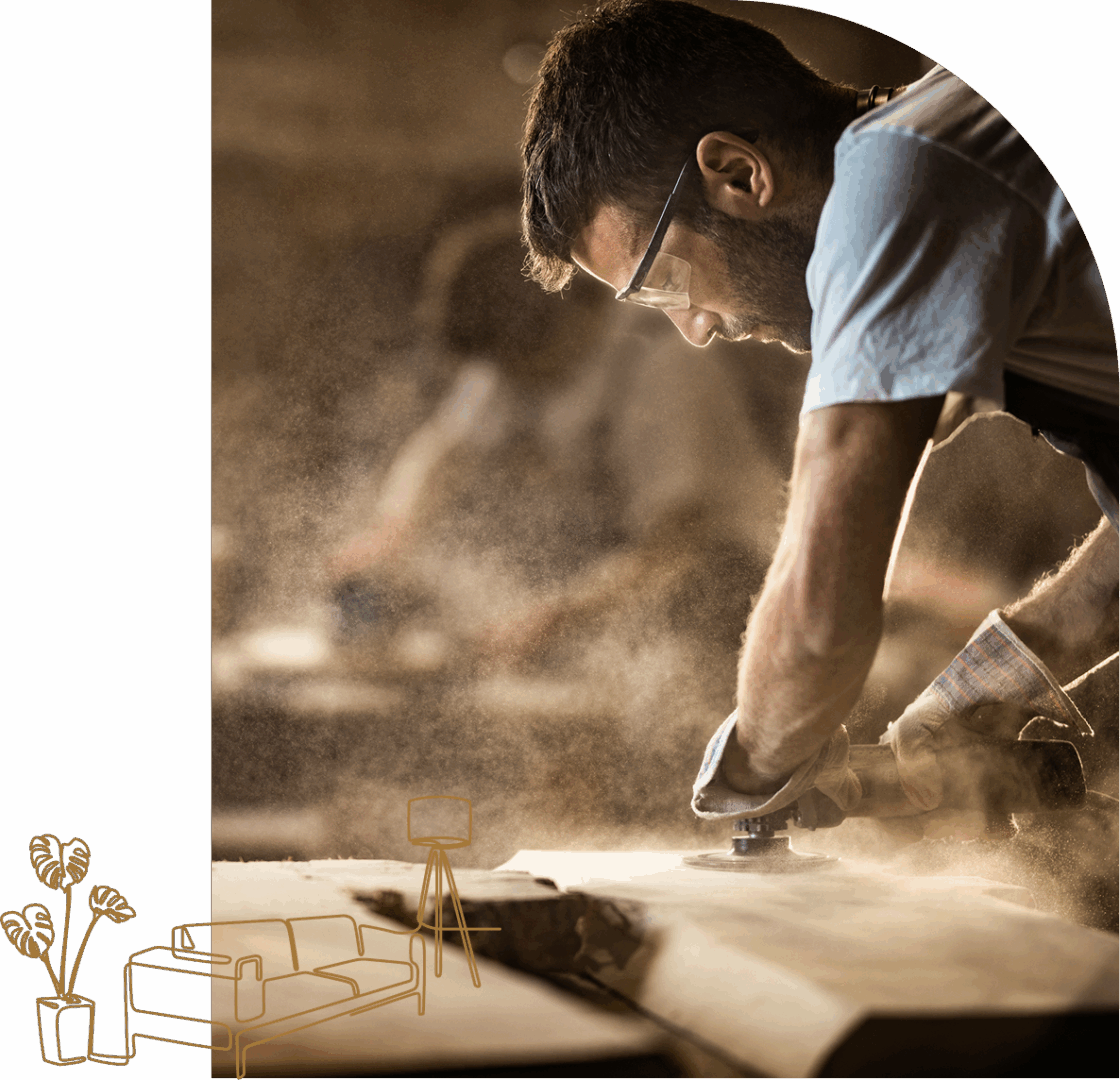 Woodworker sanding surface with electric tool.